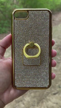 Cargar y reproducir el video en el visor de la galería, Cristales de diamantes transparentes con anillo para el dedo | Estuche dorado de TPU/PC (Serie iPhone 8)
