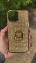 Load and play video in Gallery viewer, Gold Topaz Crystals with Finger Ring | Gold TPU/PC Case (iPhone 12 Series)
